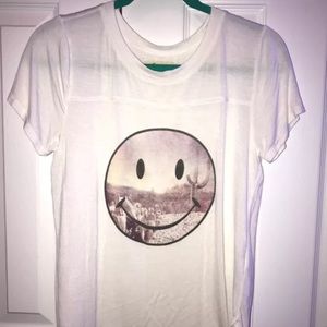 White shirt with smiley face